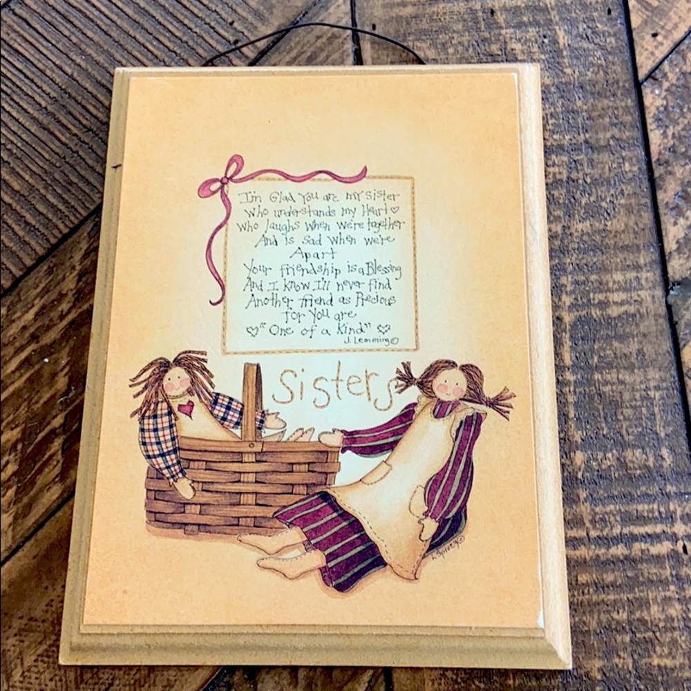 Sisters wood wall art